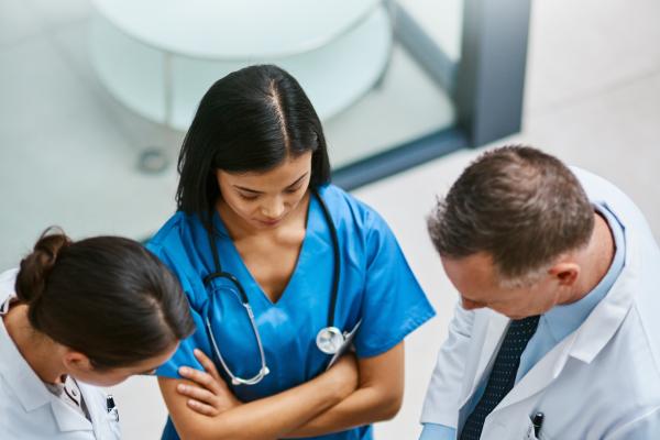 Image of medical staff consulting with each other